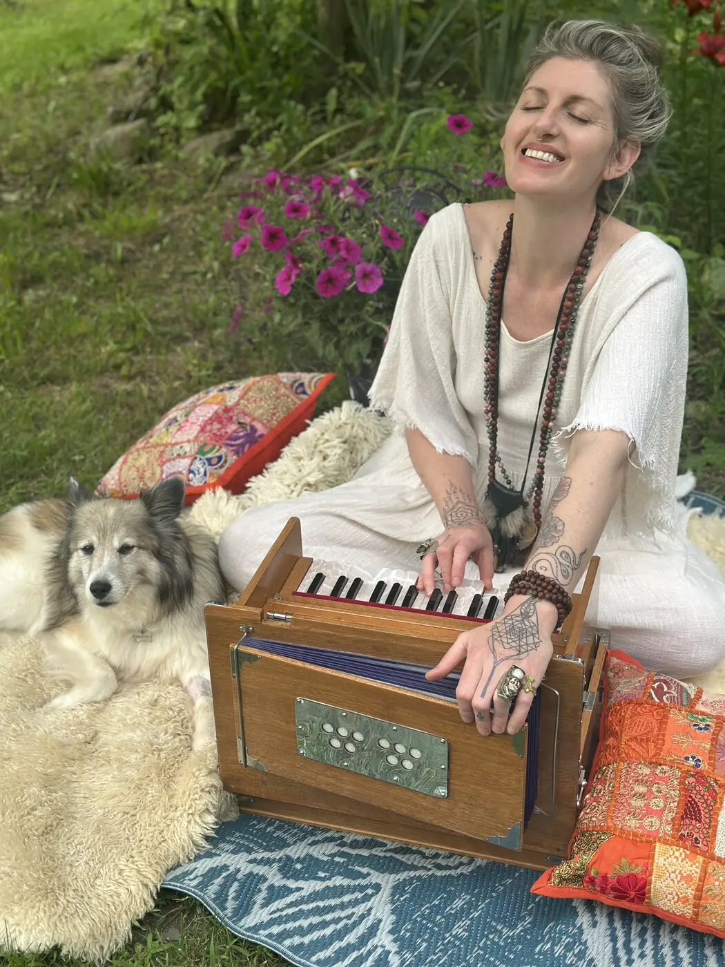 A woman singing while playing the harmonium